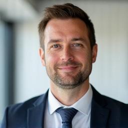 Portrait of Adam Dąbrowski, Community Lead at Cyber Gry.